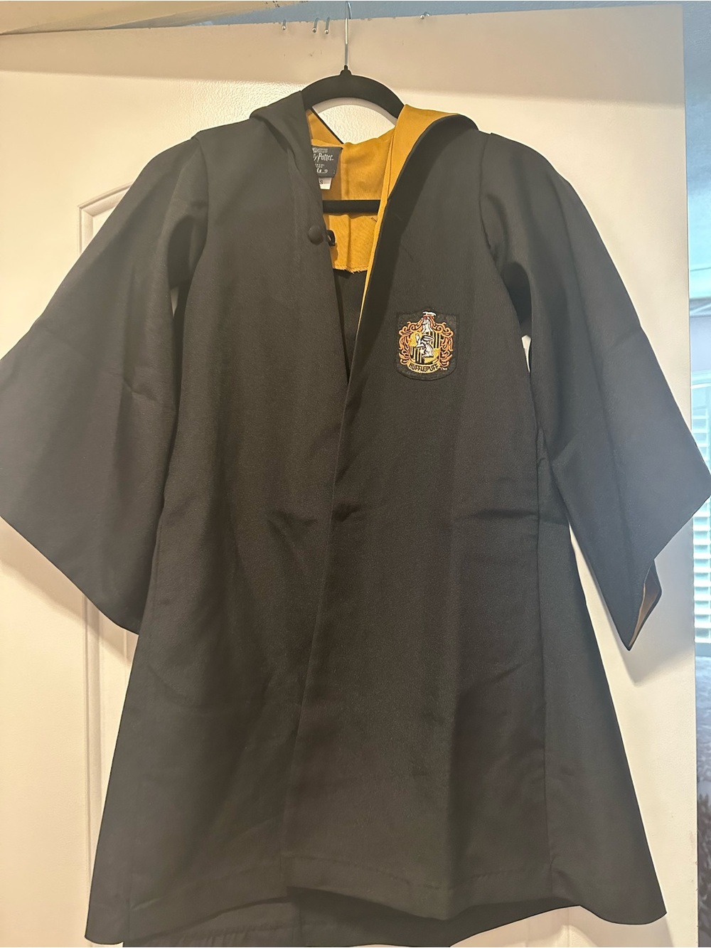 Warner Bros. Kids Black Hooded Cape with Gold Lining and Crest